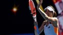 La joie d'Alizé Cornet, qualifiée pour le premier quart de finale de Grand Chelem de sa carrière, après sa victoire face à la Roumaine Simona Halep à l'Open d'Australie, le 24 janvier 2022 à Melbourne