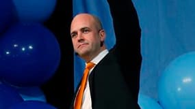 Le Premier ministre suédois Fredrik Reinfeldt est devenu dimanche le premier leader de centre-droit à remporter deux élections législatives successives mais se voit privé de la majorité absolue en raison du bon score de l'extrême-droite. /Photo prise le 1