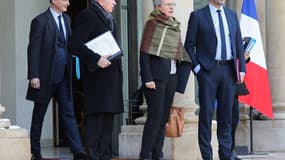 Bruno Le Maire, Gérard Collomb, Geneviève Darieussecq et Christophe Castaner, le 8 février à la sortie de l'Elysée.