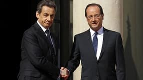 Lors de la passation de pouvoir le 15 mai dernier à l'Elysée. Les Français pensent à 44% que l'action de l'Elysée aurait été meilleure en cas de réélection de Nicolas Sarkozy, contre 26% qui pensent le contraire, selon un sondage Harris Interactive pour l