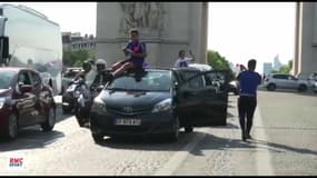 Équipe de  France : Chants, Marseillaise et fumigènes sur les Champs-Elysées 