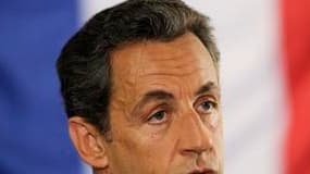 Nicolas Sarkozy entend capitaliser sur le refus des socialistes d'inscrire dans la constitution une "règle d'or" limitant les déficits pour illustrer les risques d'un retour de la gauche au pouvoir. /Photo prise le 12 juillet 2011/REUTERS/Philippe Wojazer