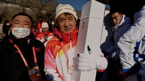 Jackie Chan avec la flamme olympique