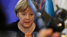 La chancelière allemande, Angela Merkel, à Bruxelles. L'Allemagne rejette plusieurs mesures du projet de conclusions du sommet européen, notamment la possibilité d'octroyer une licence bancaire au futur mécanisme de soutien à l'euro et la création d'euro-