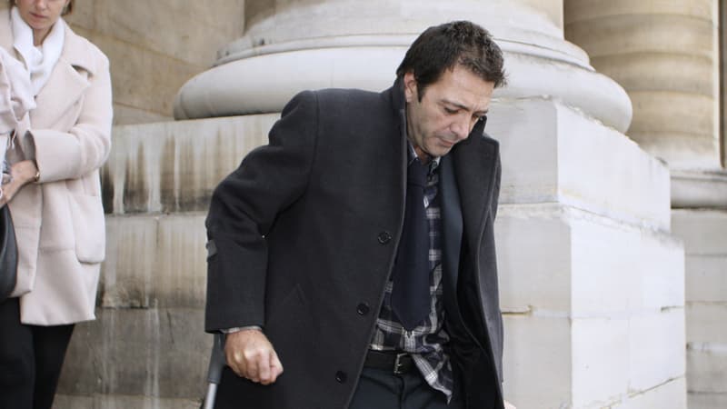 Ian Griffin et sa compagne à la sortie du tribunal, le 5 décembre 2014.