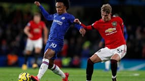 Le Brésilien Willian (à gauche)