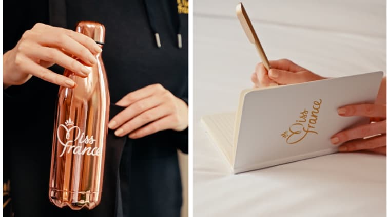 Une gourde et un carnet vendus sur la boutique en ligne Miss France officielle. Une gourde et un carnet vendus sur la boutique en ligne Miss France officielle.