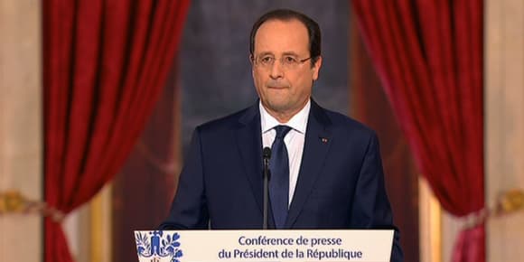 Les lèvres de François Hollande étaient serrées.