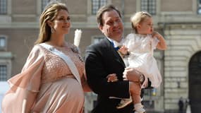 Madeleine, son mari et leur fille Leonore lors du mariage de Carl Philip et Sofia.