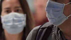 Image d'illustration - passagers arrivant à l'aéroport de Guarulhos, à Sao Paulo, au Brésil - NELSON ALMEIDA / AFP