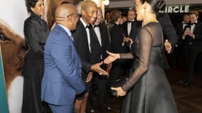 Pharrell Williams face à Meghan Markle et au prince Harry, le 14 juillet 2019 à la première européenne du Roi Lion à Londres