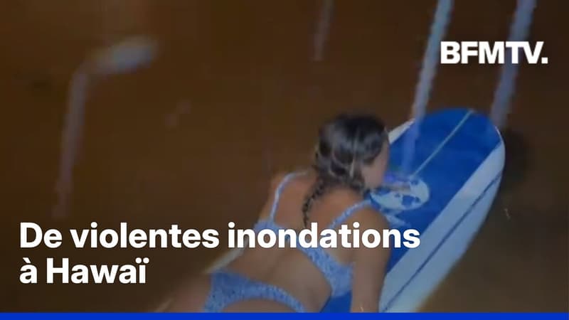 À Hawaï, certains habitants se déplacent sur leur planche de surf après de violentes inondations