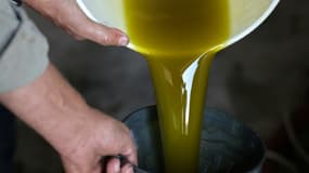Production d'huile d'olive dans une usine du village d'Assira al-Shamaliya, le 25 octobre 2021