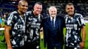 Jean-Michel Aulas entouré de Florent Malouda, Eric Deflandre et Sonny Anderson lors du "match des héros"