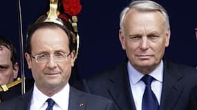 Soixante et un pour cent des Français sont satisfaits de François Hollande comme président de la République et 65% de Jean-Marc Ayrault comme Premier ministre, selon un sondage Ifop pour le Journal du Dimanche. /Photo prise le 15 mai 2012/REUTERS/Pascal R