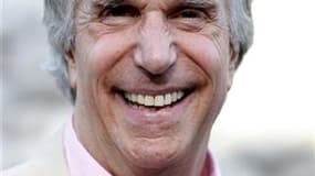 L'acteur américain Henry Winkler, l'aussi célèbre que décontracté "Fonzie" du feuilleton télévisé "Happy Days" ("Les Jours heureux") dans les années 70 et 80, a été fait officier de l'Ordre de l'Empire britannique (OBE) par la reine Elizabeth pour son eng