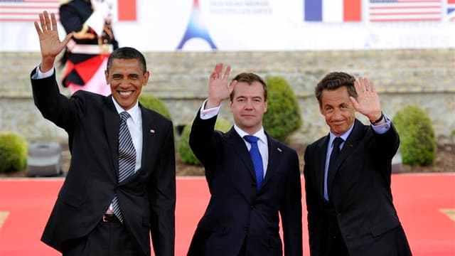 Les présidents Barack Obama, Dmitri Medvedev et Nicolas Sarkozy au sommet du G8 à Deauville. Les multiples bouleversements survenus à travers le monde en 2011 vont continuer à propager leurs ondes de choc imprévisibles en 2012, année par ailleurs riche en