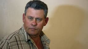 Le chasseur professionnel zimbabwéen Theo Bronkhorst sort du tribunal, le 29 juillet 2015 à Hwange