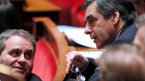 Xavier Betrrand (G) et François Fillon (D) à l'Assemblée nationale, le 18 décembre 2013.