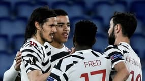 Manchester United, battu par l'AS Roma malgré un doublé d'Edinson Cavani (g), au stadio olimpico le 6 mai 2021, est qualifié pour la finale de la Ligue Europa