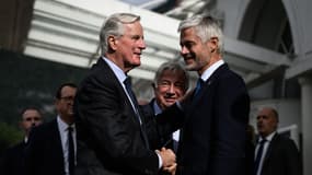Laurent Wauquiez accueille le Premier ministre Michel Barnier, aux journées parlementaires du parti de droite Les Républicains (LR) à Annecy, le 12 septembre 2024.