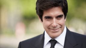 David Copperfield arrive à la célébration de l'ouverture du musée de la Statue de la Liberté à Battery Park le 15 mai 2019 à New York. 