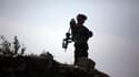 Soldat de la légion étrangère française en patrouille dans la province de Kaboul en Afghanistan. Selon une source proche du dossier, l'armée française devra économiser 3,5 milliards d'euros sur la période 2011-2013 dans le cadre de la politique de réducti
