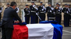 Gérald Darmanin, ministre démissionnaire de l'Intérieur, à Nice (Alpes-Maritimes) le lundi 2 septembre 2024 lors de la cérémonie d'hommage national à Éric Comyn, gendarme tué à Mougins lors d'un refus d'obtempérer le lundi 26 août.