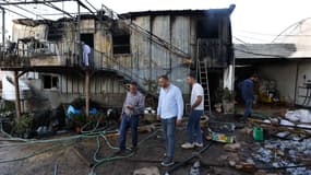 Une maison brûlée par des colons israéliens à Deir Sharaf, en Cisjordanie occupée, le 9 septembre 2025