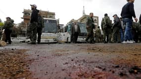 Sur le site d'un attentat, le 11 mars 2017 à Damas, en Syrie