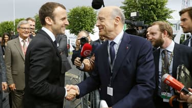 Emmanuel Macron et Alain Juppé le 16 juin 2016 à Villepinte.