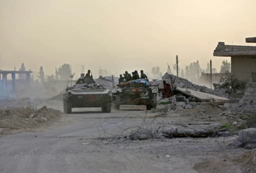 Des chars des forces armées syriennes lors de leur avancée dans la Ghouta orientale, le 4 mars 2018 Des chars des forces armées syriennes lors de leur avancée dans la Ghouta orientale, le 4 mars 2018