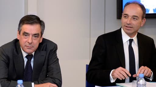 François Fillon et Jean-François Copé lors d'une réunion à l'UMP, le 18 décembre 2013.