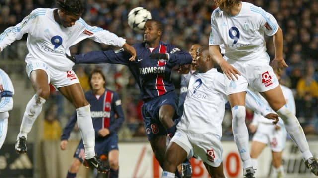 Didier Drogba et Daniel Van Buyten face au PSG