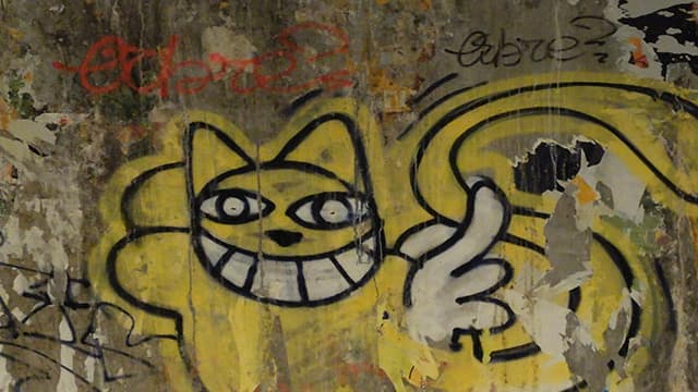 Un chat peint par le street artiste Monsieur Chat, Thoma Vuille.