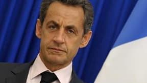 La popularité de Nicolas Sarkozy est en baisse de deux points en octobre à 30% de bonnes opinions selon un sondage OpinionWay pour le quotidien Metro. /Photo prise le 7 octobre 2011/REUTERS/Philippe Wojazer