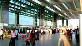Des voyageurs dans un aéroport en Inde (Photo d'illustration).