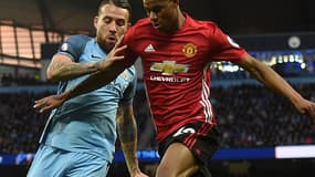 Nicolas Otamendi et Marcus Rashford