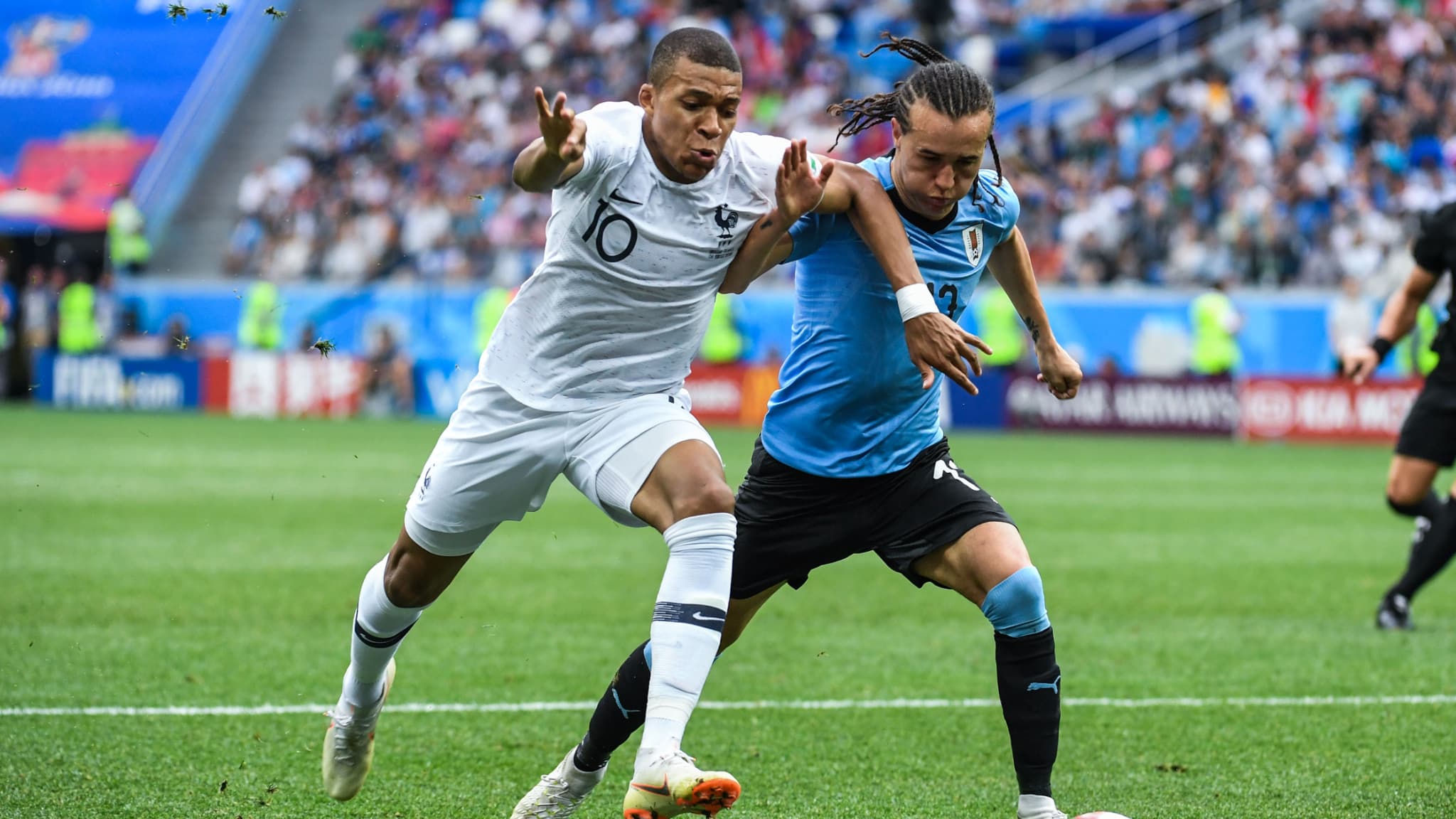 Laxalt au duel avec Mbappé lors du Mondial 2018