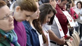 Chrétiens d'Irak en pèlerinage à Lourdes lors d'une prière, ce vendredi 15 août.