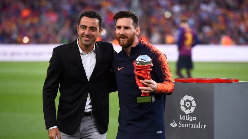 Xavi et Messi, deux capitaines emblématiques de Barcelone.
