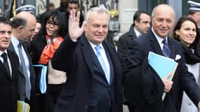 Jean-Marc Ayrault, entouré de ses ministres (Manuel Valls à gauche et Laurent Fabius à droite), lors de la rentrée du gouvernement.