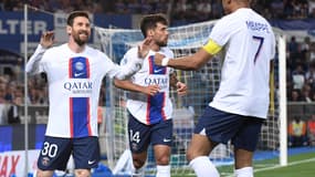 Lionel Messi, Juan Bernat et Kylian Mbappé