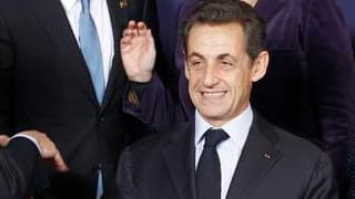 Le président français Nicolas Sarkozy en compagnie du Premier ministre portugais José Socrates et de la chancelière allemande Angela Merkel, jeudi à Bruxelles. Selon des sources diplomatiques, un accord a été trouvé jeudi entre les Etats membres de l'UE p