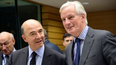 Pierre Moscovici et Michel Barnier, le 18 décembre 2013.