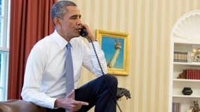 Barack Obama, expert en pieds sur le bureau.