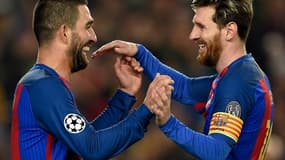 Arda Turan et Lionel Messi