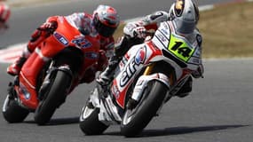 Randy de Puniet devant Casey Stoner
