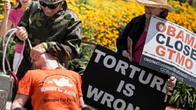 Des activistes anti-torture et favorables à la fermeture de la prison de Guantanamo en manifestation à Washington