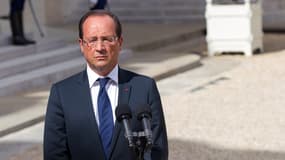 Françiois Hollande devant le palais de l'Elysée, le 25 août.